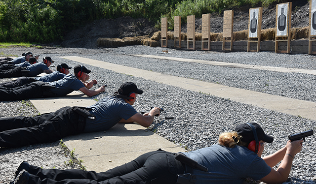 Police academy cadets using the range