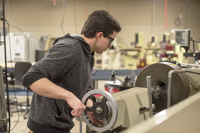 Student completing a Journeyman Machining certificate as part of the ndustrial Technology program